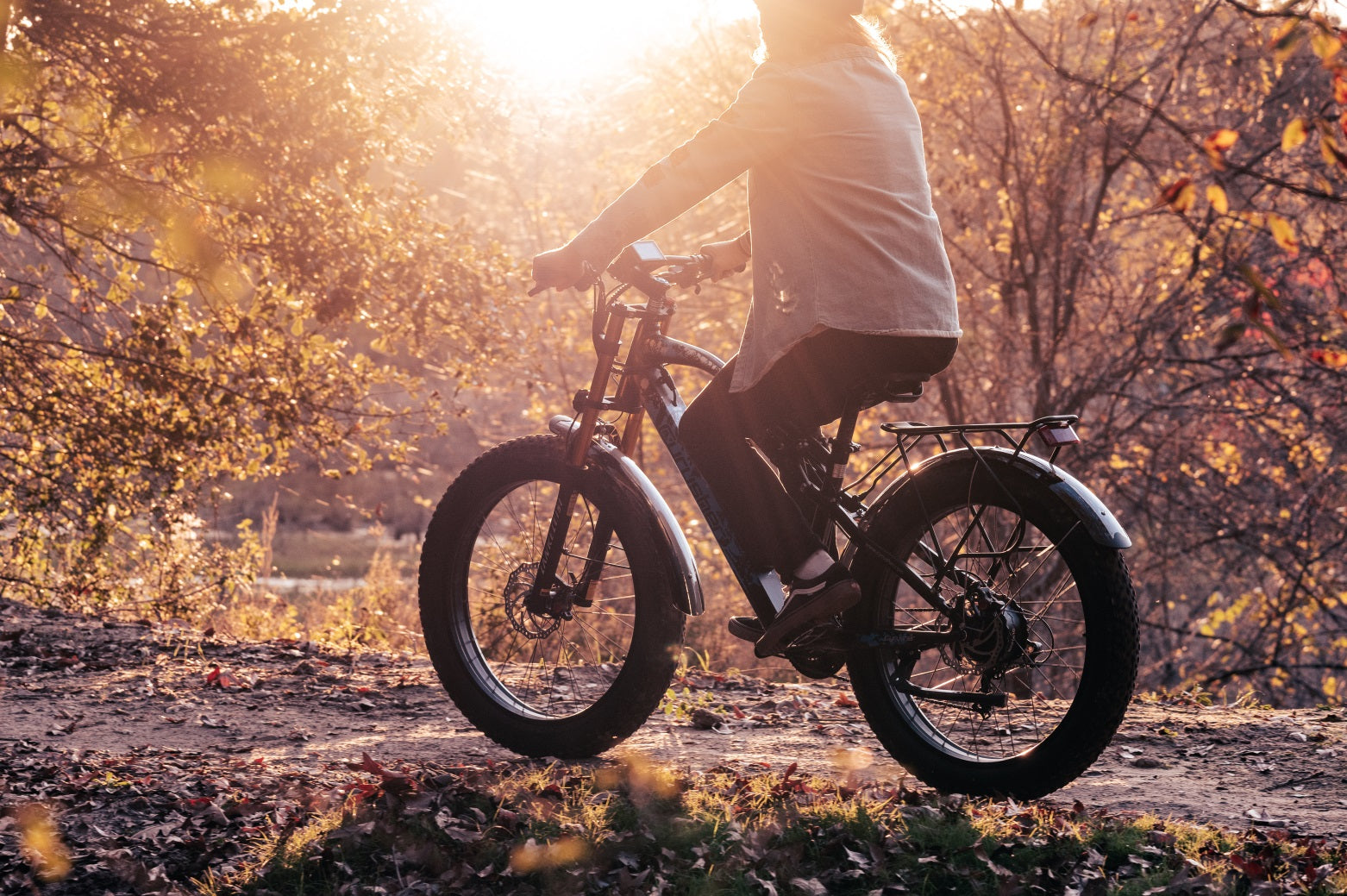 the sun is shining a woman and XF900 electric bicycle